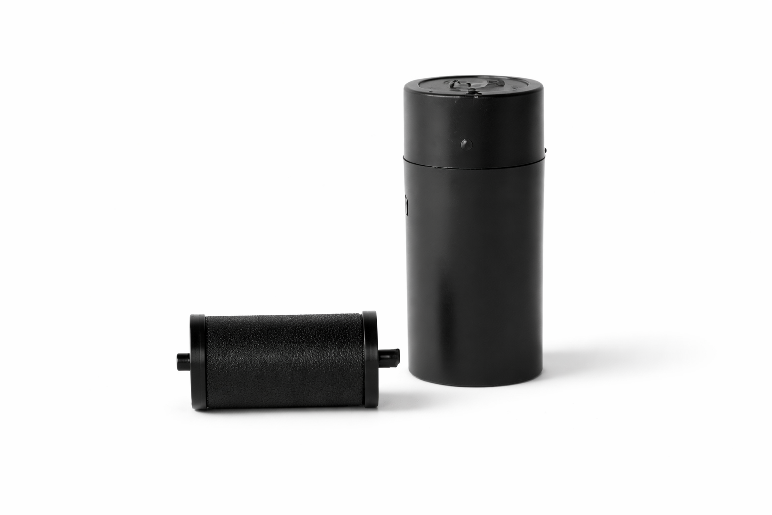 Two black rollers on a white background