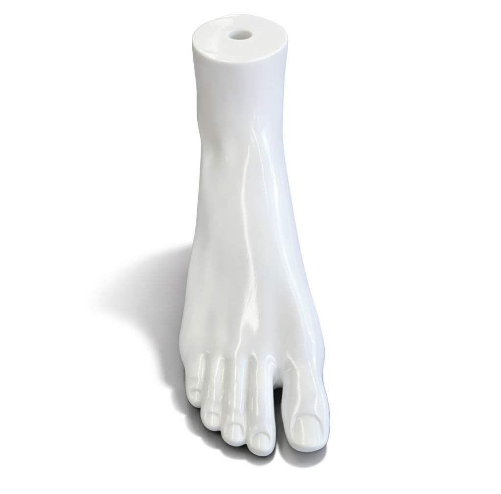 White plastic display foot on a white background