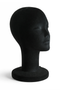 black flocked female head form on a white background