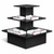 Black tiered display stand with folded white towels on a white background