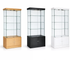 Three glass display cases in different colors on a white background
