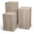 Set of three wooden cube tables on a white background