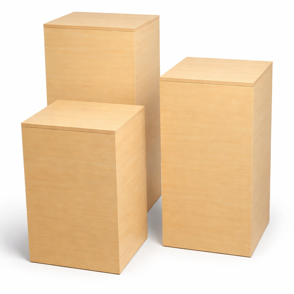 Three wooden boxes of different sizes on a white background