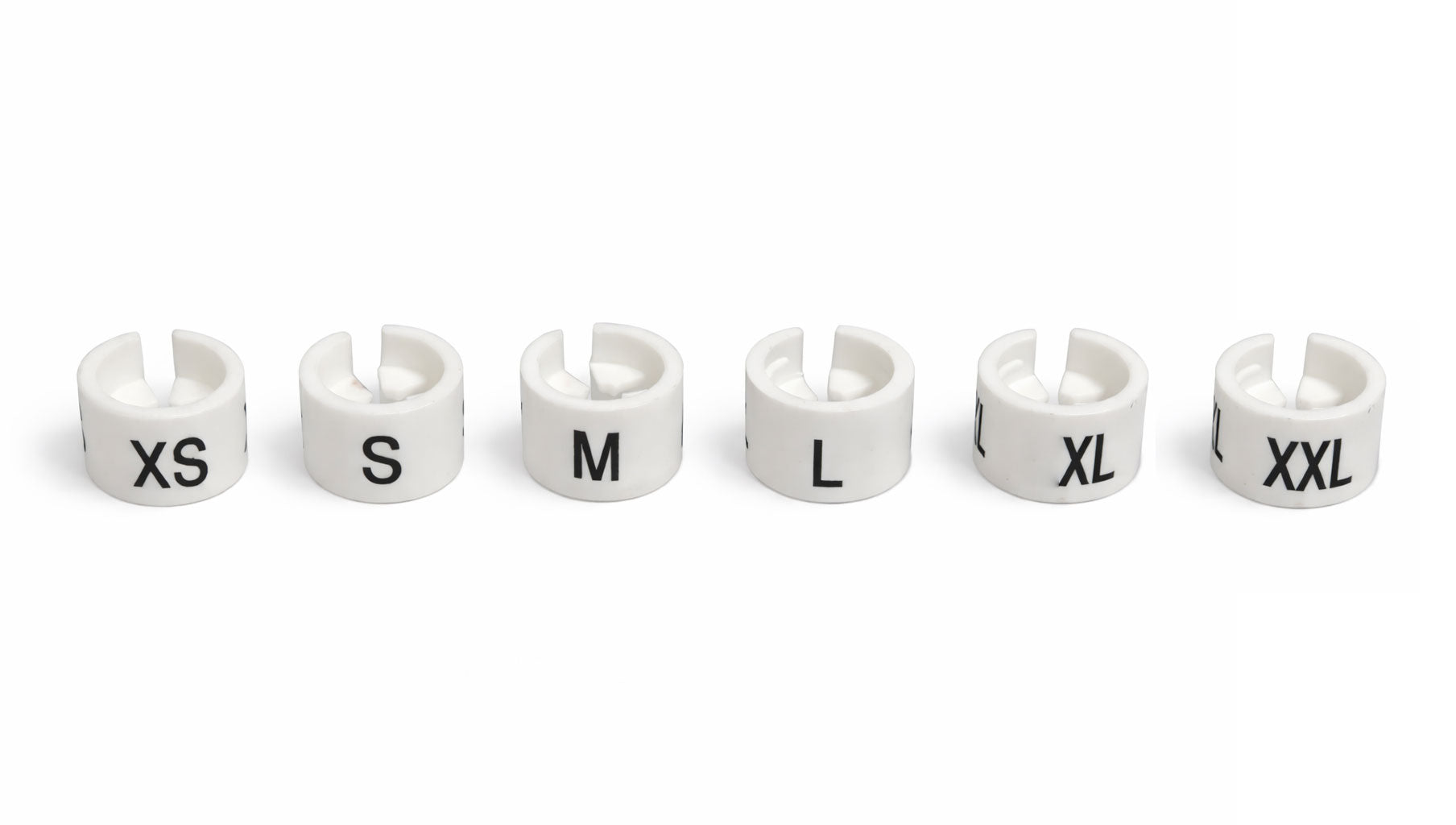 Set of white size markers for clothing on a white background