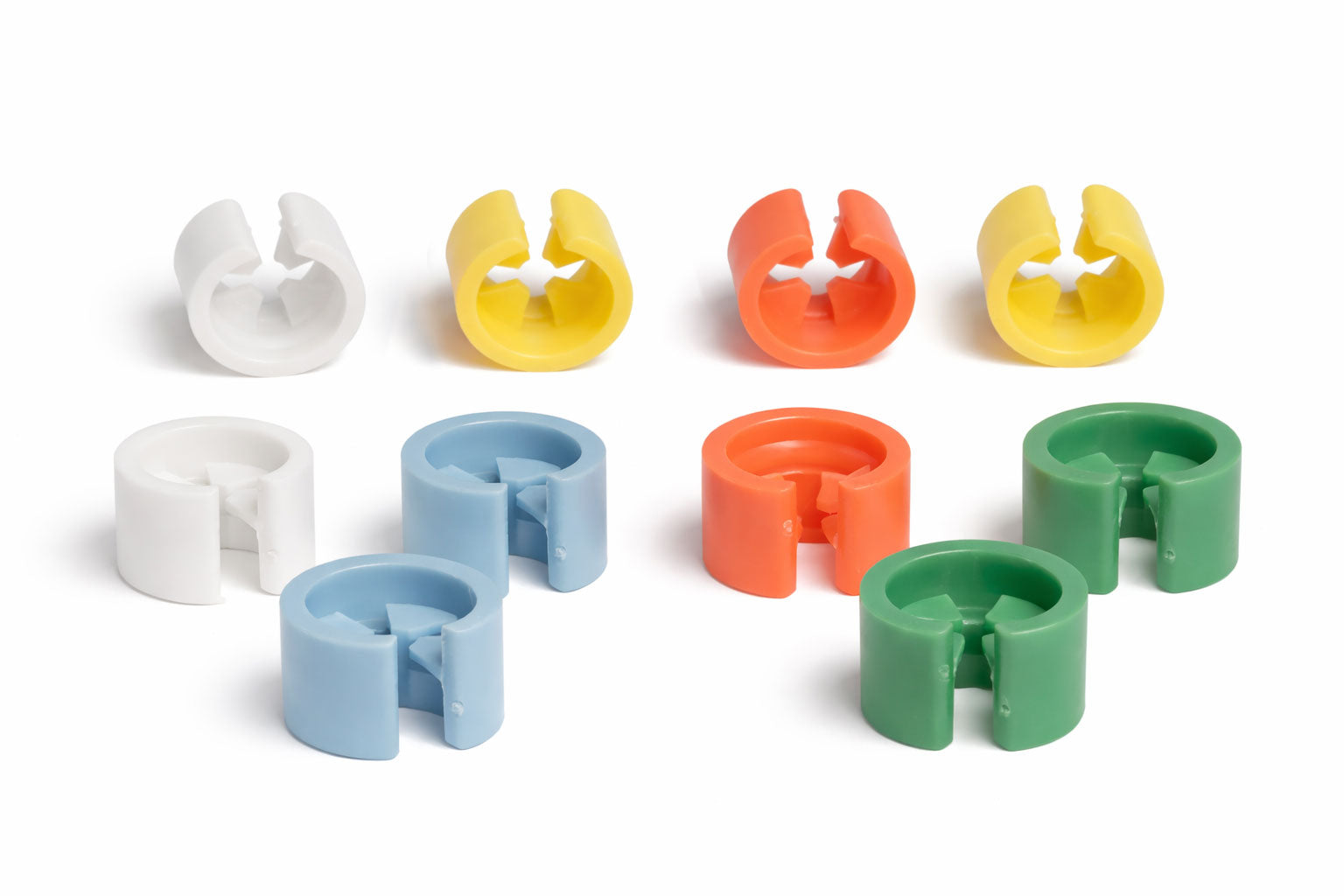 Set of colorful plastic hanger coders on a white background