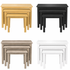 Set of four nesting tables in different colors on a white background