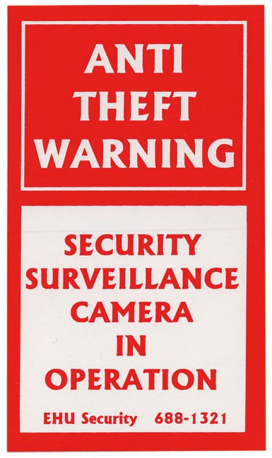Security Camera Sticker | Eddie's Hang-Up Display Ltd.