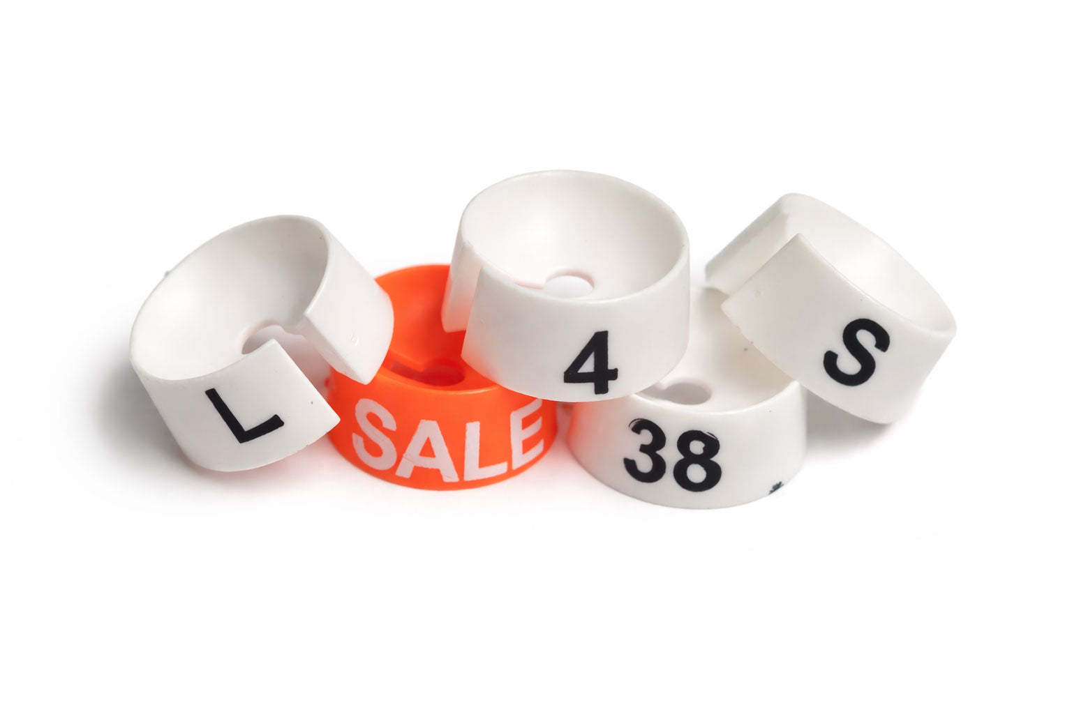 Set of white size labels with text on a white background